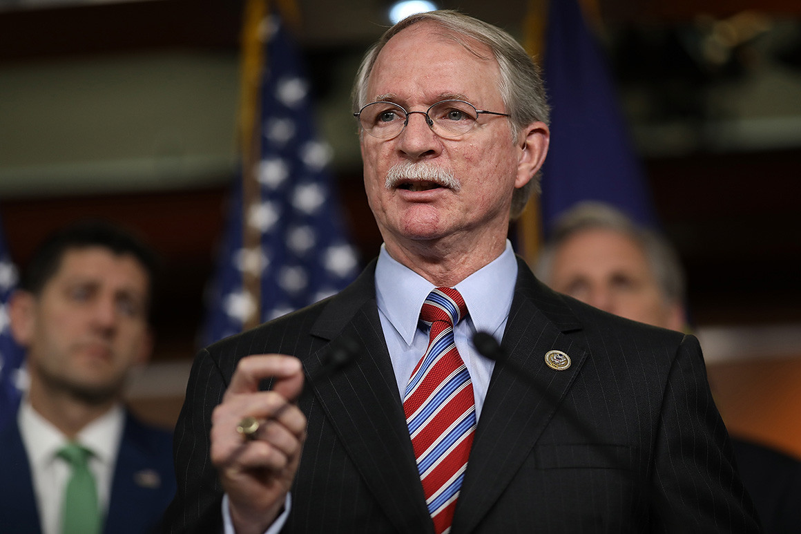 Rep. John Rutherford speaking at a press conference podium